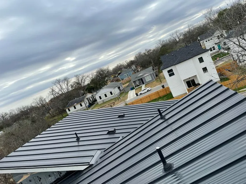 Standing seam metal roof panels with vents for Skylight Repair in Jennings